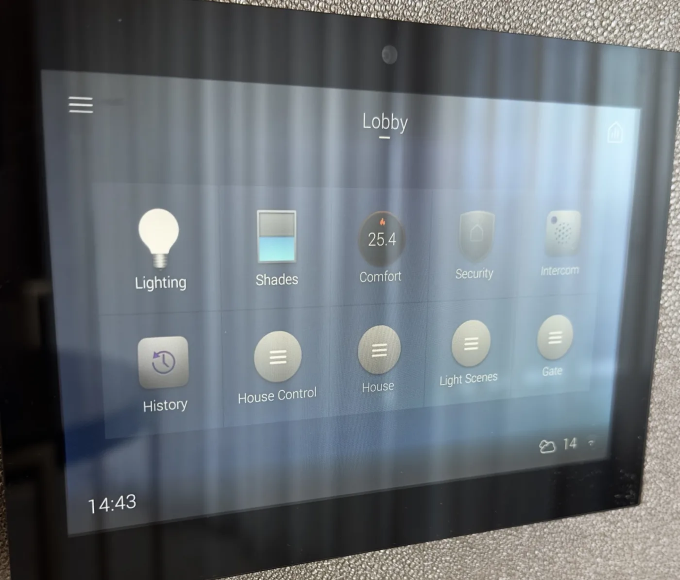 Control4 touchscreen on a wall, Lobby page